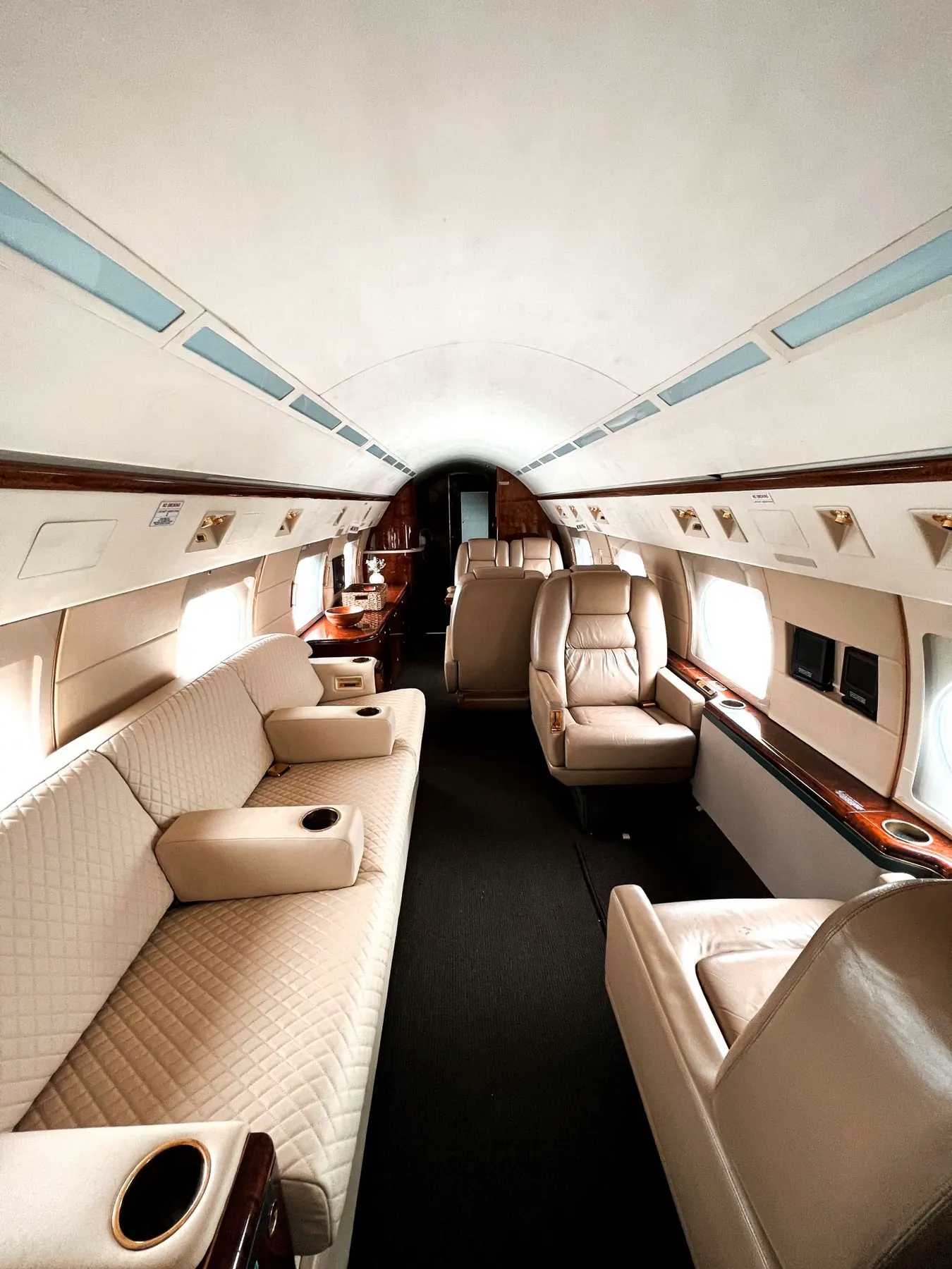 Cream-toned private aircraft cabin
